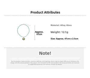 Detail view of green beaded resin necklace with 47cm length and alloy glass pendant