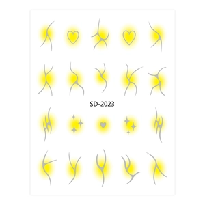 Detailed view of nail stickers with abstract silver lines and yellow gradient star patterns