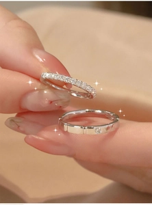 Close-up of sugar cube minimalist silver rings with sparkling pavé cubic zirconia details
