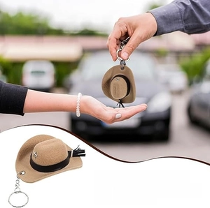 Miniature tan felt cowboy hat keychain with silver star detail and easy-to-carry metal ring