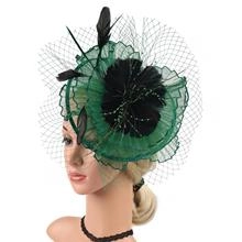 Detail of dark green mesh fascinator with black feathers and shimmering sequins