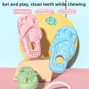 Detail of durable TPR slipper-shaped dog chew toys with massage nodes and bear design