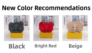 Three elephant-shaped coin purses in black, red, and beige with pebbled leather finish