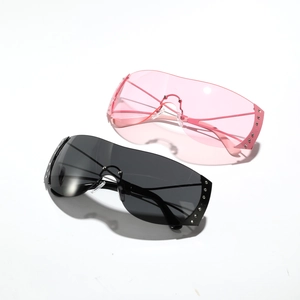 Futuristic rimless Y2K sunglasses with studded rhinestone metal frame in pink and black