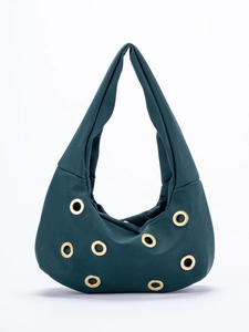 Detail of dark green suede hobo bag with gold metal eyelets and seamless shoulder strap