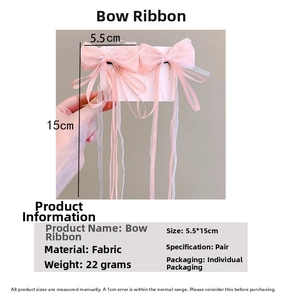 Detailed view of pink bow-knot hair clips with mesh ribbons and size measurements