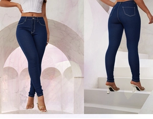 Detail showing high waist skinny jeans in dark blue with contrast stitching and fit