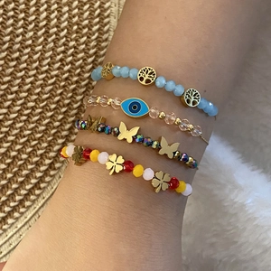 Ensemble de 4 bracelets en perles de cristal avec breloques Œil Mauvais, Arbre de Vie et papillon