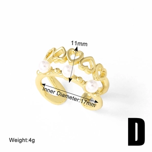 Detail view of gold adjustable double-layer ring with heart design and three pearls