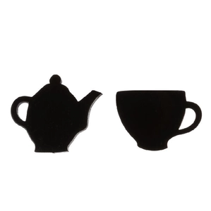 Minimalist black kettle and teacup stud earrings made of stainless steel on white background