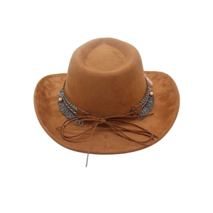 Detail of western brown suede cowboy hat with ethnic braided band and colorful beads