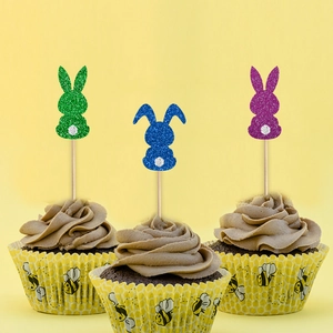 Glitter bunny cake toppers in green, blue, and purple for Easter party cupcake decoration