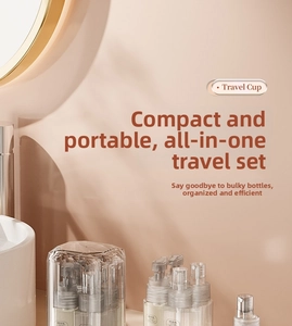 Close-up of portable travel bottle set with spray and pump dispensers in a storage case