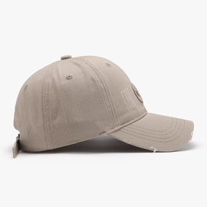 Distressed khaki cotton baseball cap with vintage 3D embroidery and frayed brim detail