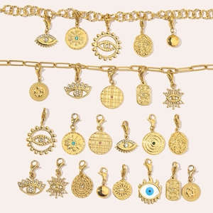 Polished gold stainless steel evil eye charms and chain set with sparkling zircon details