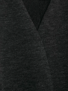 Macro shot of dark grey knit fabric texture on a soft belted casual jacket