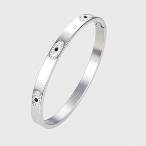 Minimalist silver eye bangle with crystal pave and black stone on brushed stainless steel