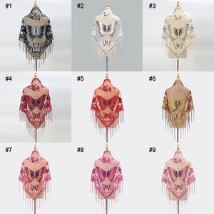 Detailed grid of lace triangular shawls with butterfly embroidery and fringed edges