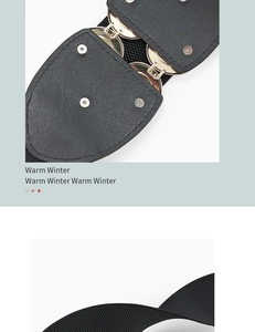 Detail of black elastic corset belt with vintage gold buckle and metal rivet studs