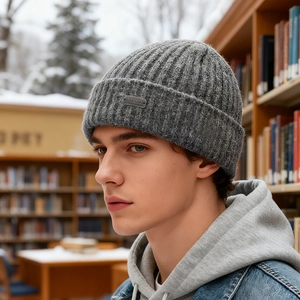Gray ribbed knit beanie for men and women featuring a metallic NY&ED logo plate