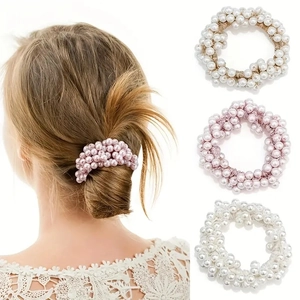 Elegant beaded pearl hair ties in white, pink, and beige for stylish ponytails