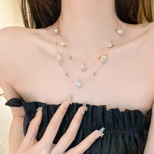 Elegant double-layered stainless steel necklace featuring baroque pearls for women