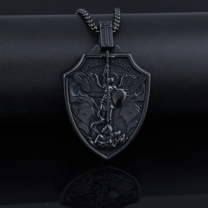 Macro view of Archangel Michael shield pendant in antique finish stainless steel