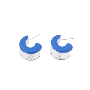 Minimalist silver needle C-shaped earrings with vibrant blue enamel finish on white background