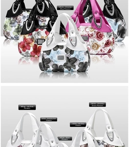 Close-up of printed PU leather tote bags with floral patterns and metallic hardware