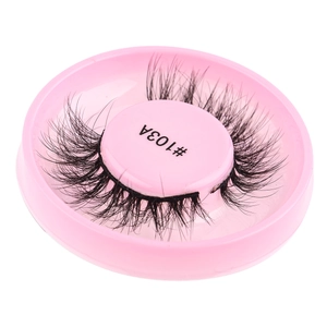 Close-up of model #103A self-adhesive thick eyelashes in a pink round tray