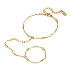 Minimalist gold stainless steel finger chain bracelet with integrated ring for women