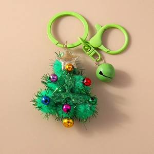 Christmas tree keychain with colorful bells and gold star on a green metallic ring