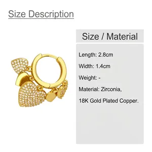 Golden heart-shaped layered earrings with white zircon accents in 18K gold plated copper