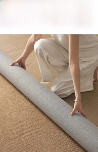 Detail of high-density sisal-style rug showing heavy-duty weave and flat lay on wood floor