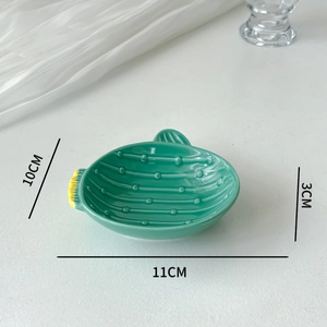 Detail view of cactus ceramic sauce dish showing precise dimensions 11cm by 10cm