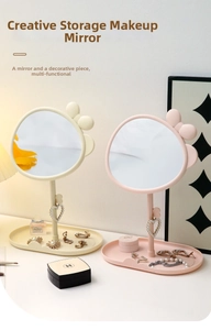 Pink and beige tabletop makeup mirrors with bow details and heart-shaped jewelry hooks