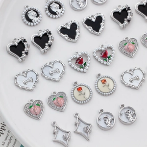 DIY jewelry charm set with heart star and pearl tulip designs for handmade accessories