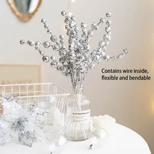 Glittery silver Christmas berry picks with bendable wire stems for tree decoration