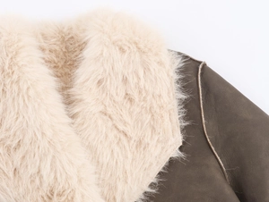 Detailed close-up of brown faux leather collar with beige plush faux fur lining