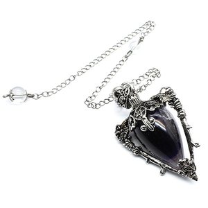 Detailed close-up of a purple teardrop labradorite pendant with a silver star motif frame