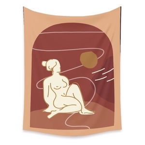 Close-up of bohemian wall tapestry with minimalist line art and earth-toned geometry