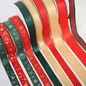 Christmas gift ribbons set with gold elk and snowflake patterns in red, green and gold