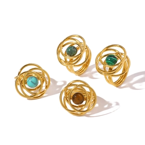 Set of four vintage gold stainless steel rings with natural tiger eye and turquoise stones