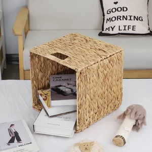 Cesta de almacenamiento tejida natural con asas para libros y organización