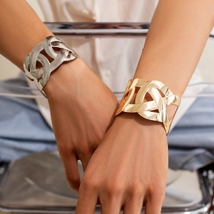 Minimalist wide hollow cuff bracelet with woven texture in gold and silver metal finishes