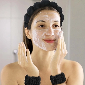 Black puffy headband and wristband set for facial washing and skincare routines