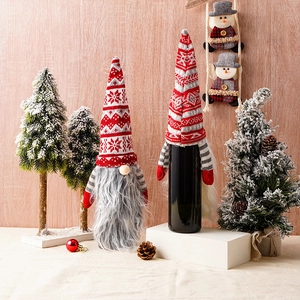 Knitted Christmas gnome wine bottle cover with long beard and Nordic hat decorations