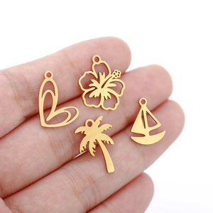 Polished gold stainless steel charms in heart, flower, palm tree and boat shapes