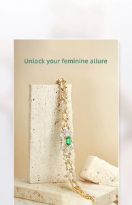 Detail shot of vintage emerald bracelet with geometric links on natural stone