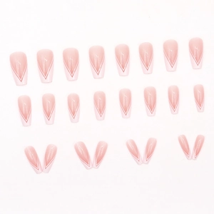 Pink coffin press-on nails with white V-cut French tips arranged on a white background